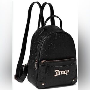 Juicy black medium sized backpack with gold logo